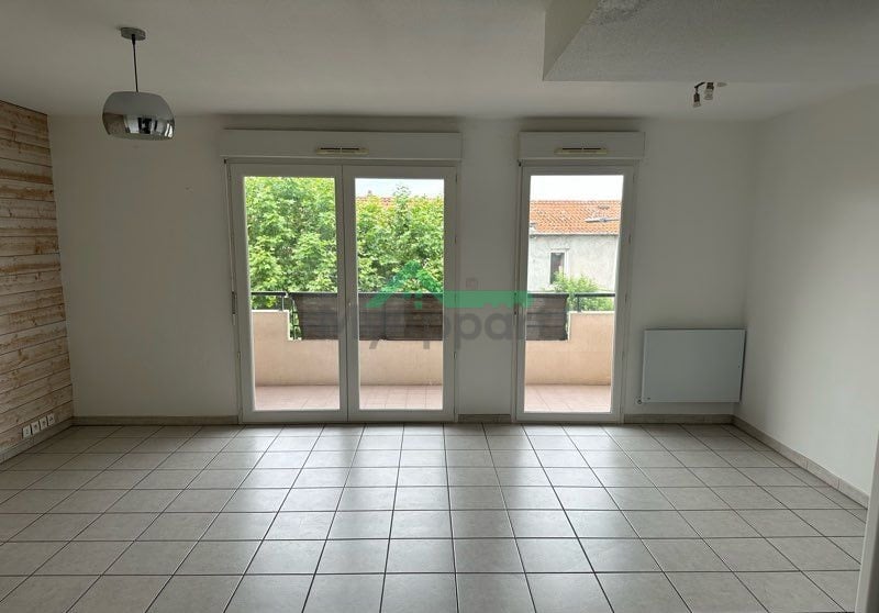 ? T2 52m² avec balcon + garage – Secteur Les Arboras – au calme — photo 1